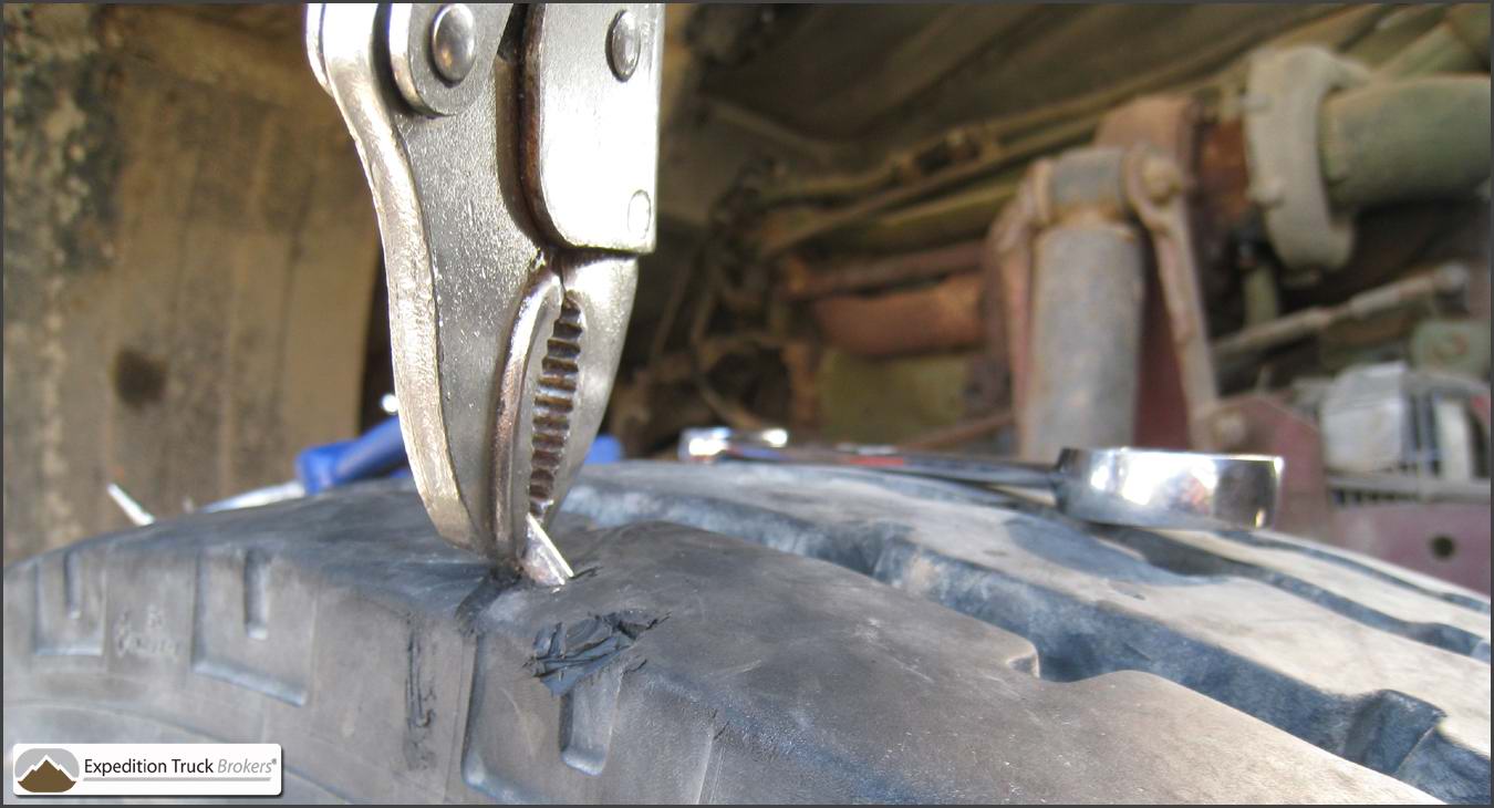 Nail causing overland truck tire puncture